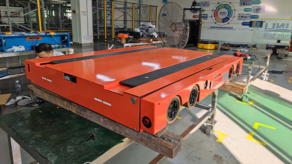 Four-way shuttle vehicle mechanical version in red and orange color