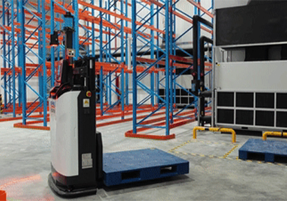 Pallet-moving and picking AGV for flat warehouse handling