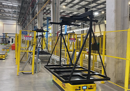 Lifting and lowering type AGV inter-process transfer within the workshop