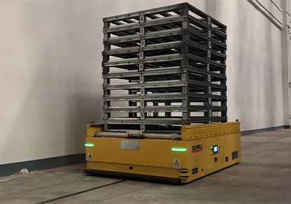 Roller-mounted AGV transports empty pallets