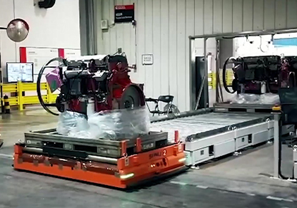 Load-bearing roller-based AGV for inter-process transportation
