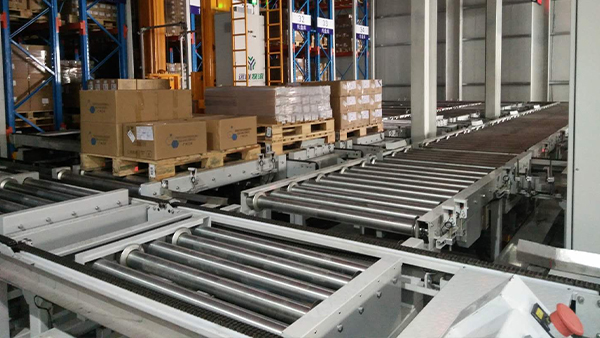 Lifting transfer conveyor